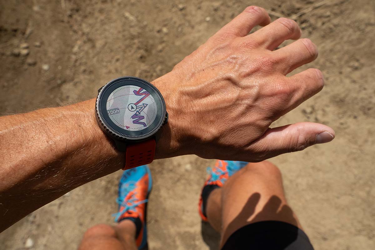 A fitness watch with a navigation display on a wrist